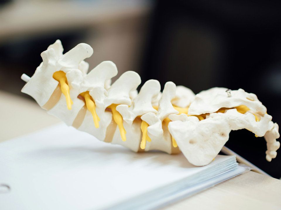 Facet joint block and radiofrequency rhizotomy procedure for spine pain